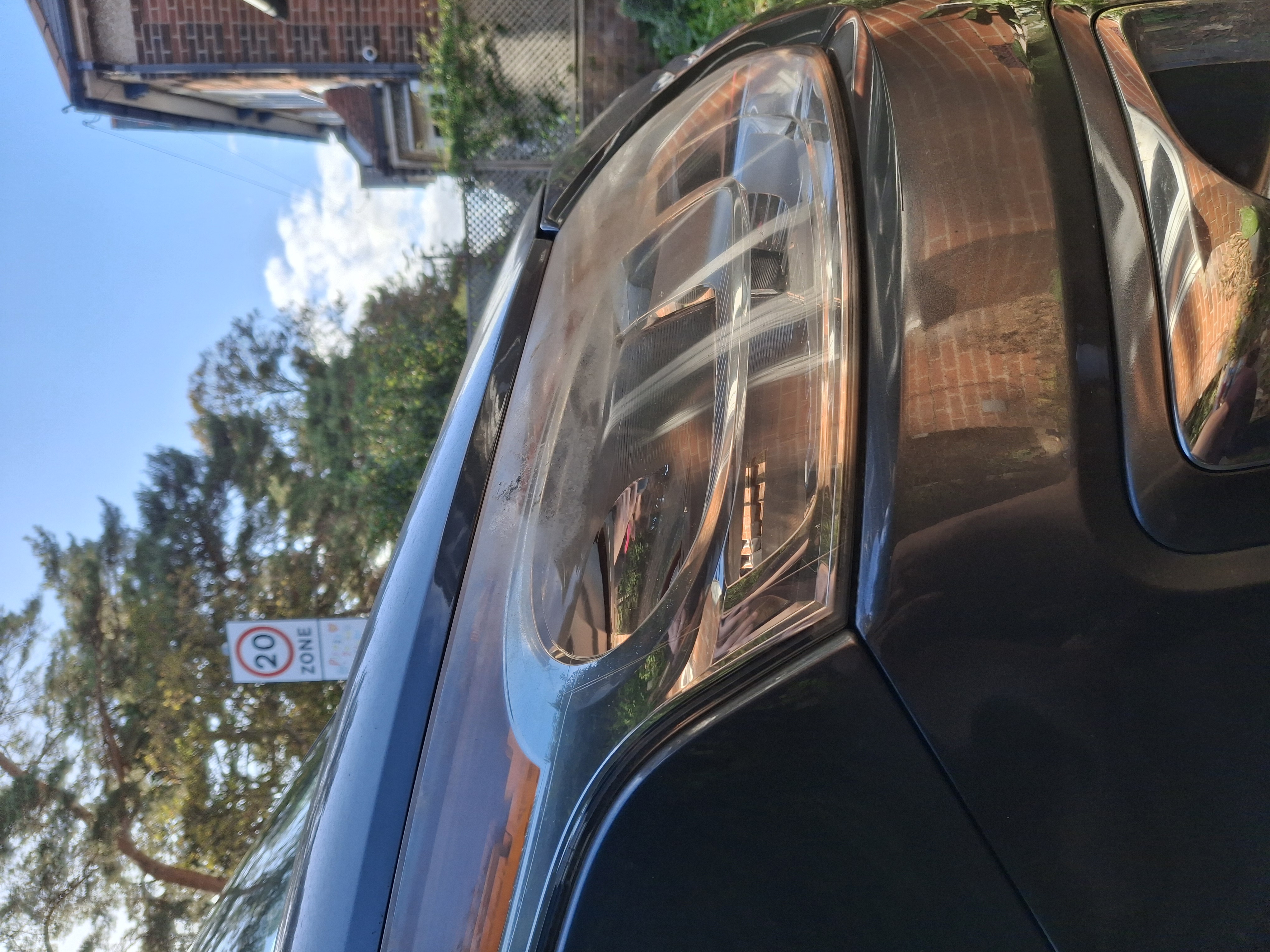 Headlight before restoration — cloudy and yellow